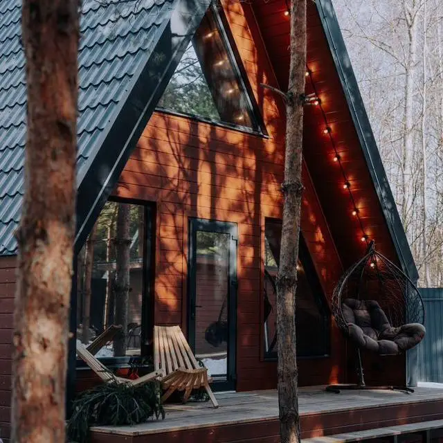 Real photos of A-frame in a pine forest near Lake Klyuchik