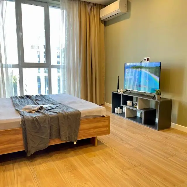 Real photos of New apartment with a bed near a panoramic window, high floor
