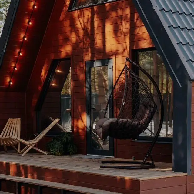 Real photos of A-frame in a pine forest near Lake Klyuchik