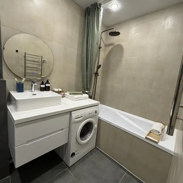 Real photos of Beautiful spacious two-room apartment in a new monolithic house. Your ideal option for remote work or leisure.