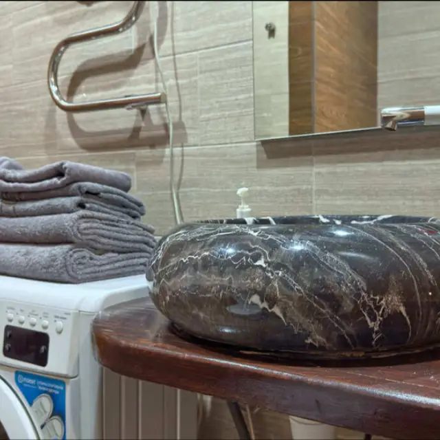 Real photos of Ma-Three apartments on 1A Amurskaya St., building 2