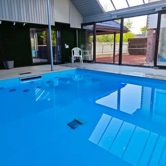 Real photos of Dom with swimming pool and sauna na Okhotskoy